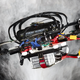 “A drone flying through smoke to visualize the complex aerodynamic effects.”